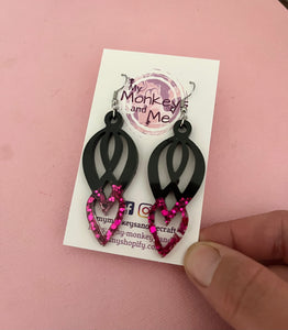 Black and magenta dangles