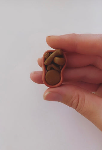 Womb brooch
