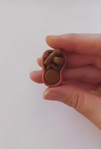Womb brooch